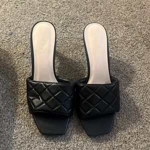black, about 1.5 inch, open toed, heels